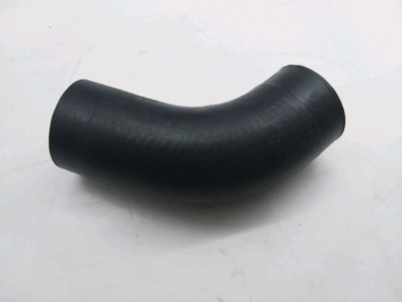 Патрубок 50-1303062 нижний 130 мм МТЗ-80